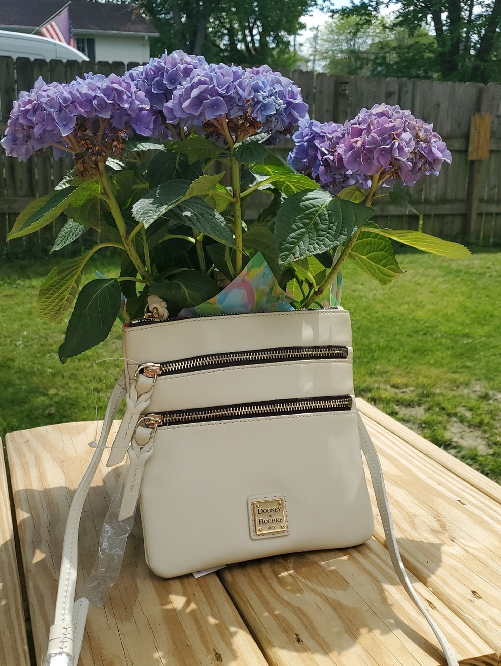 Dooney & Bourke triple Zip Crossbody Bag